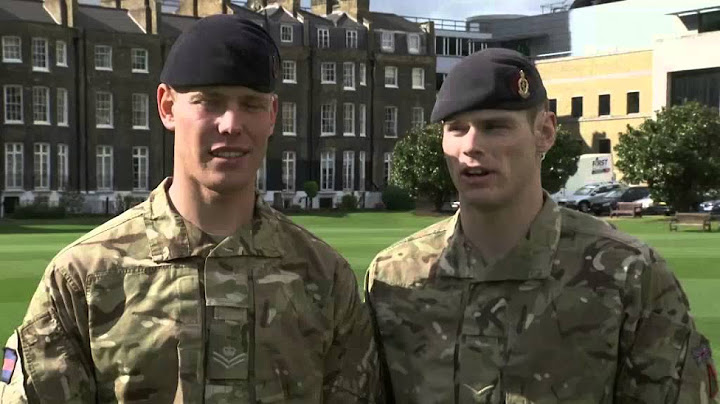 Army soldier who carried on fighting after being shot in the neck