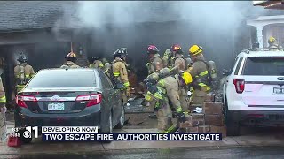 WATCH: Two escape garage fire in Colorado Springs neighborhood