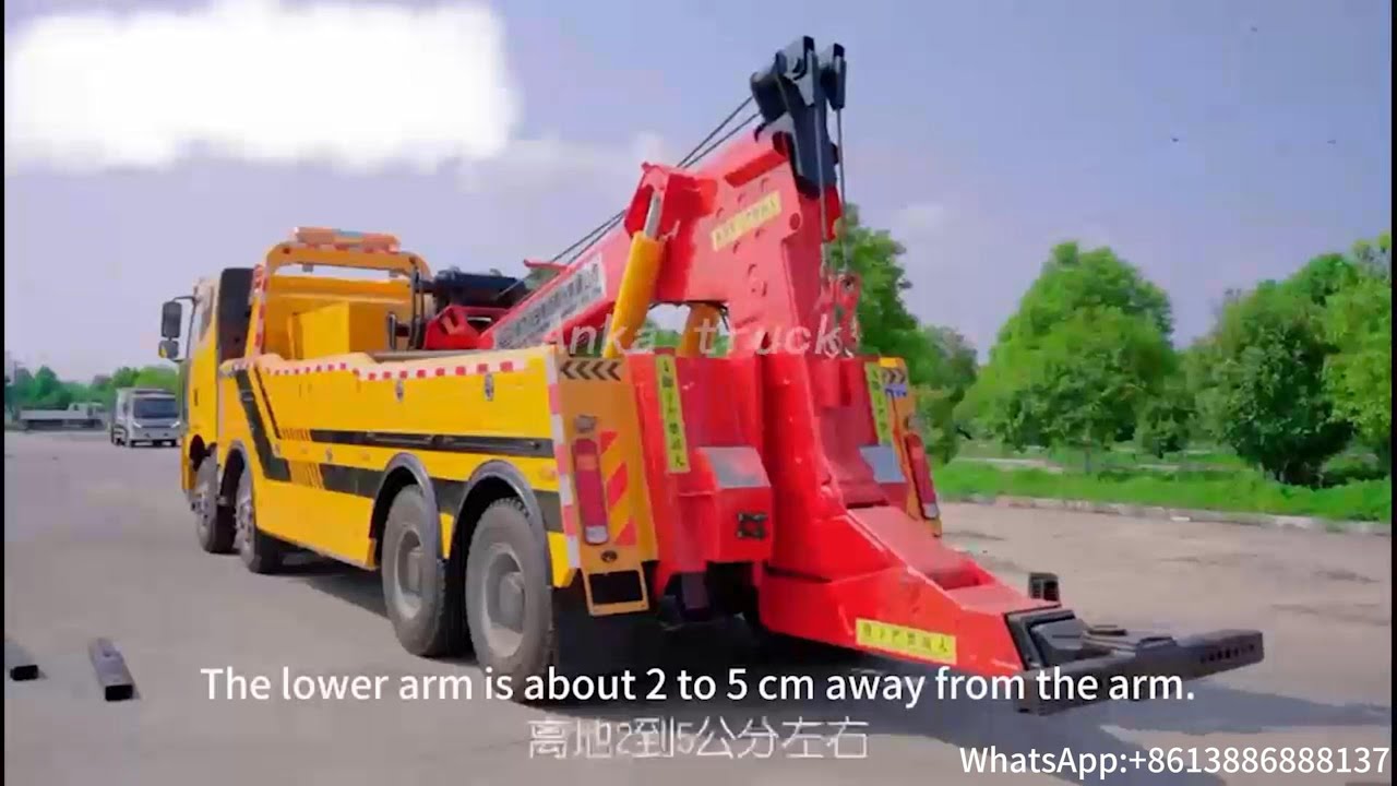 Efficiency and Strength: HOWO 8x4 Chassis Rotator Tow Truck Operation ...