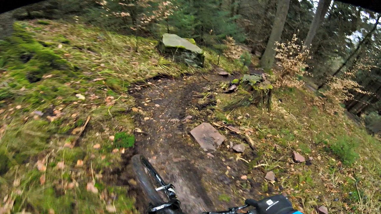 rainy enduro ride in technical terrain