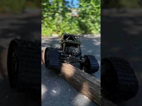 Джип на радіокеруванні гусеничний 1:18 акумулятор 4,8V пульт 2.4GHz змінні колеса для дітей та дорослих 3 кольори, видео 1