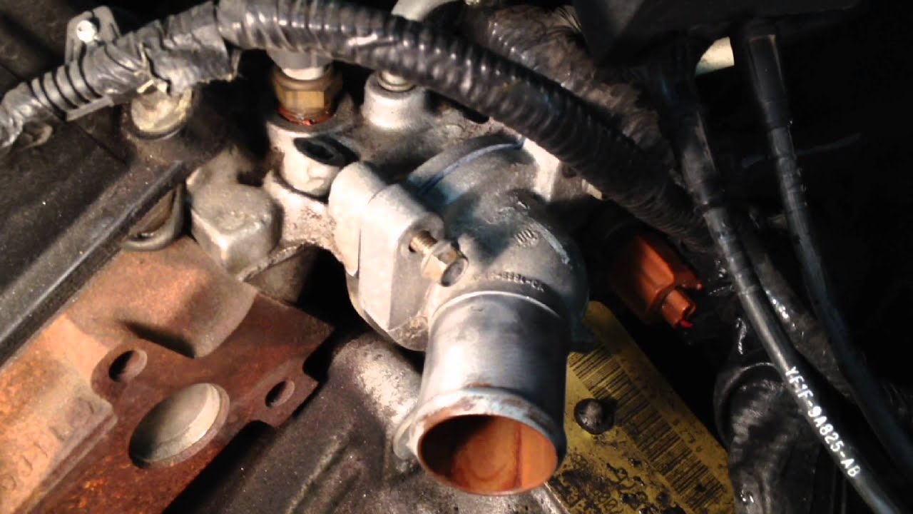 98 Ford taurus se thermostat location #6