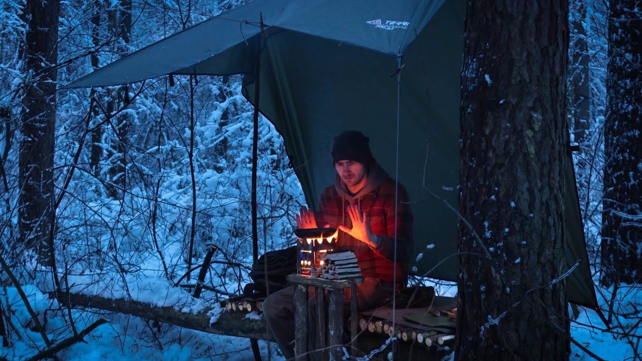 Solo bushcraft camping: building comfortable camp, cooking on camp stove
