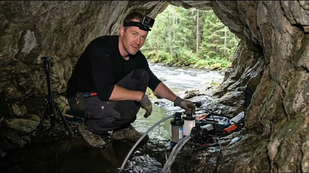 Build a house on a large rock beside a river in the middle of a beautiful and cool forest!