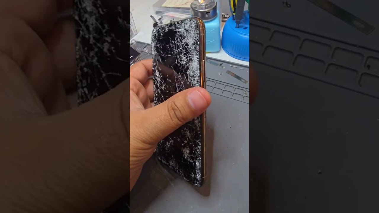 Technician replacing a cracked iPhone screen at Cheap Mobile Repair