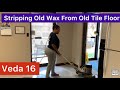 Female Removing Old Wax From Tile Floors - Trying To Make Money To Travel