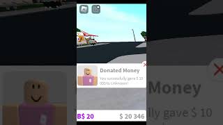 Giving Random Players on Bloxburg Money #roblox #shorts Giving Random Players on Bloxburg Money #roblox #shorts