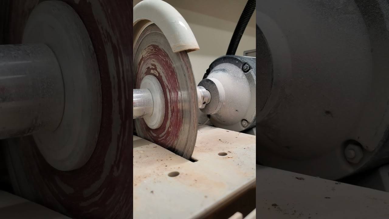 cutting moss Agate with an 8 inch cabking lapidary saw. 