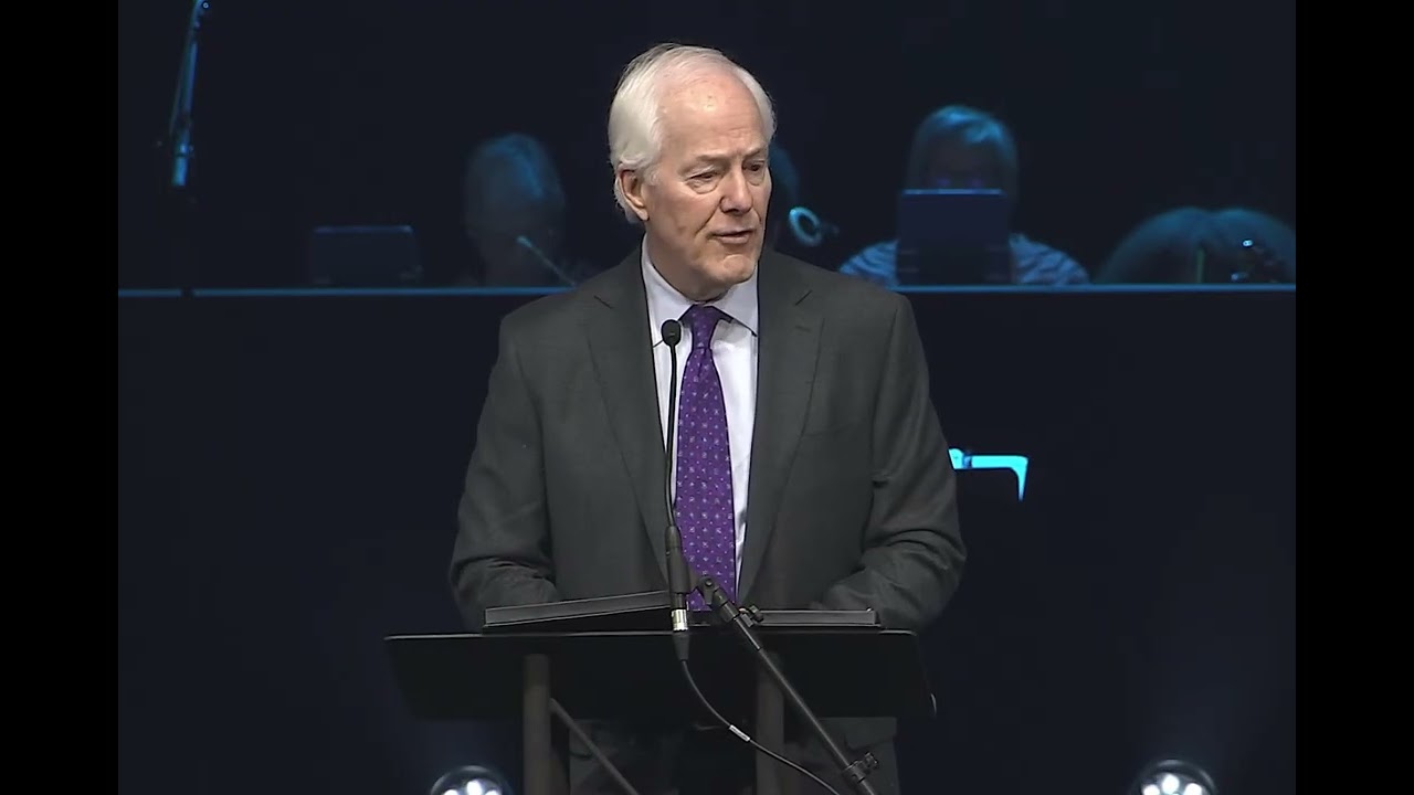 Cornyn presents a Bronze Star Medal w/ Valor to the family of the late Army Specialist John Clark.