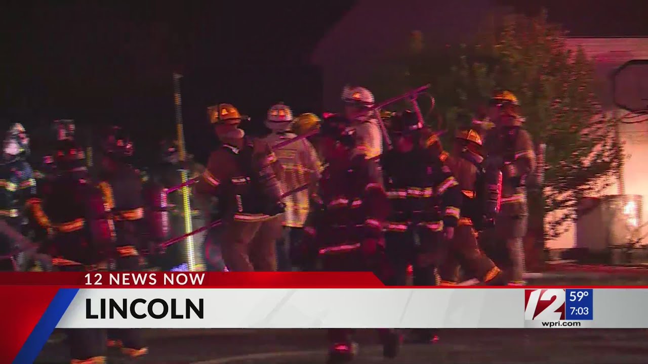 13 displaced in Lincoln house fire - YouTube