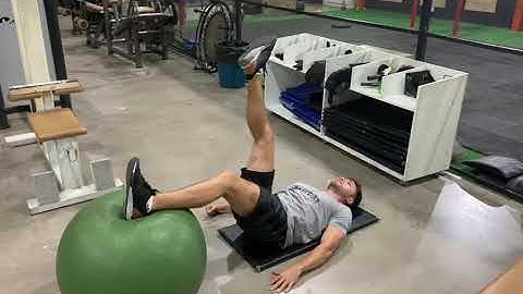 Flexão de joelho decúbito dorsal pé na bola uni-lateral