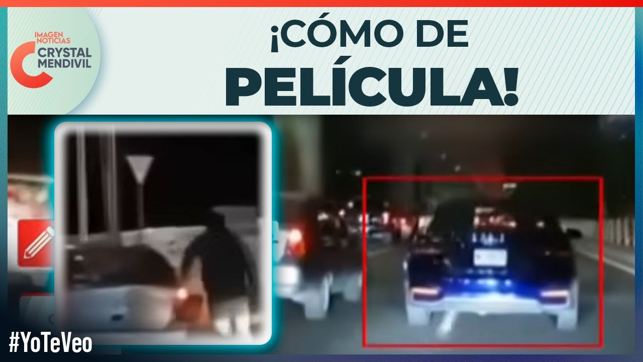 ¡Tremendas imágenes! Conductor se cuelga de un auto durante pelea vial en Periférico | Crystal 
