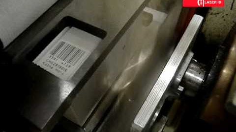 Laser coding marking 2 lines of text and barcode on a cardboard box