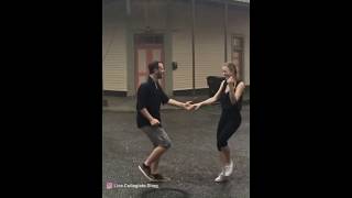 Couple dancing in the rain viral video (Live.Collegiate.Shag + Vignes Rooftop Revival) Resimi