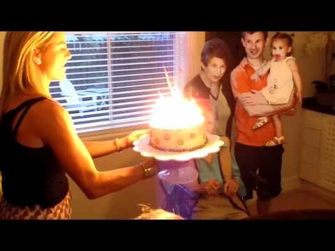 grandma-blows-out-a-cake-with-102-candles-for-her-birthday