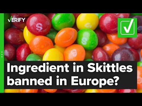 Yes, titanium dioxide, an ingredient in Skittles, is banned in Europe