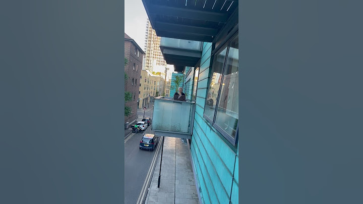 Water and rubbish flat 36 over balcony into pavement 22nd June 2024