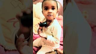 Cutie Eva playing with ear buds😍🥰😘