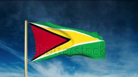 Guyana flag slider style. Waving in the win with cloud background animation Stock video by