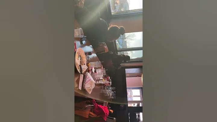 MeiMei and auntie Dianne singing at Daddys post pa...