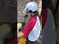 Woman riding a motorcycle in an unusual way