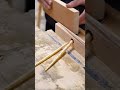 making four holes on a wood block with an electric drill for a strong and stable wood connection