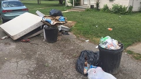 Lorain neighbors fed up over the piles of trash in their neighborhood