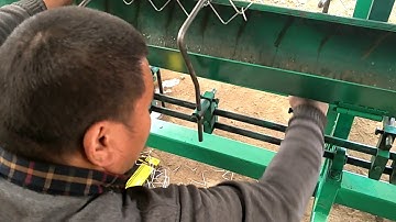 third step for adjusting double wire full automatic chain link fence machine