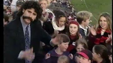 Eric Bana 1993 music video for "Out of Bounds". AFL impersonation of Rex Hunt, Dipper, Denis Cometti