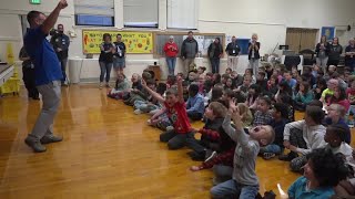 Students at Lincoln Elementary in Twin Falls receive the first Harry Potter book