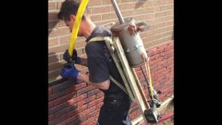 Homemade adhesive backpack pump for brick walls