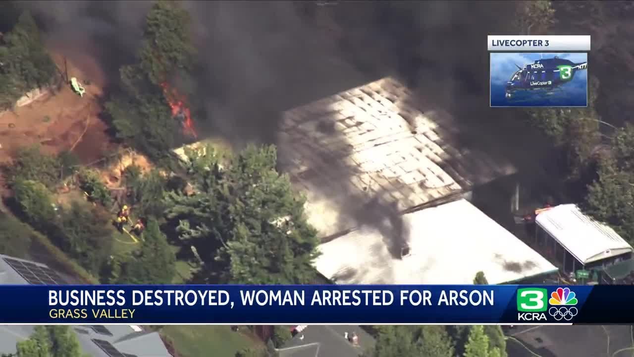 Woman arrested after fire burns Grass Valley business, vegetation