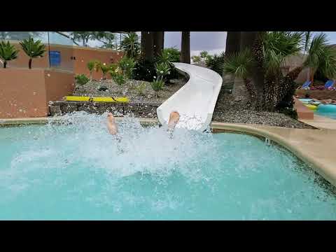 Sexy girl on water slide