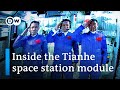 Chinese astronauts dock with Tiangong space station | DW News