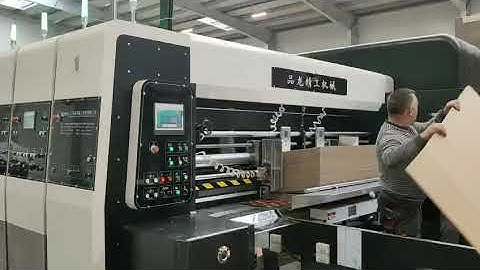 Europe 6+1 Flexo printer Slotter Die cutter vibrator stacker. Fully Computerized,whole vacuum.