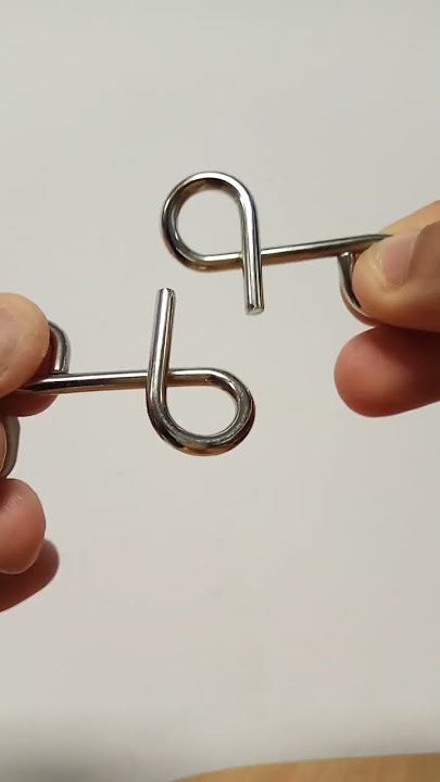 Metal brain teaser „Bent pins“ - Fridolin