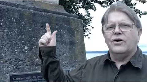 What is the curious aspect of the Birthplace of Seattle monument on Alki Beach?