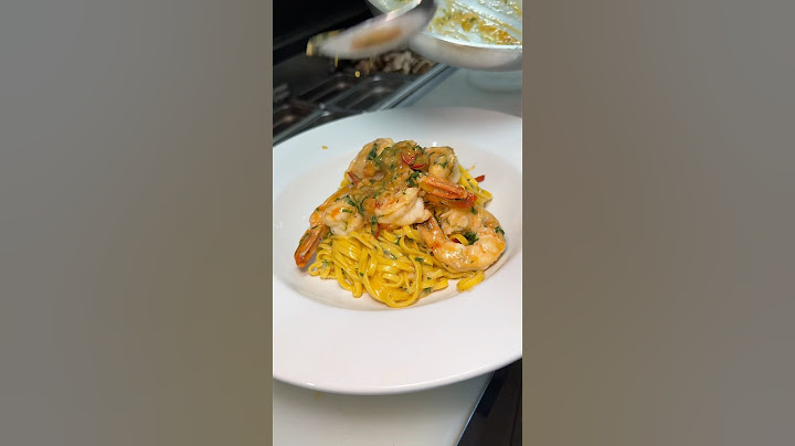 The SHRIMP SCAMPI LINGUINI in the making from Amber Steakhouse in Brooklyn NYC!! 🍤🍝🔥 #DEVOURPOWER