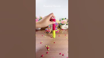 🍌Mesmerizing ASMR short video of falling beads.#reverse #asmr #satisfying