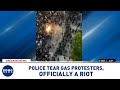 Police use tear gas on protesters, officially declared a riot