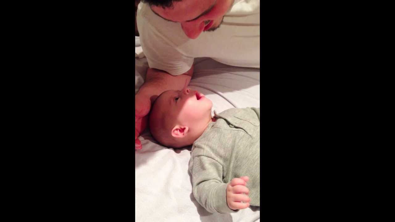 4 Month old baby telling dad a bedtime story!