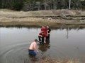 Snowmobile skippin water 4 riders at once