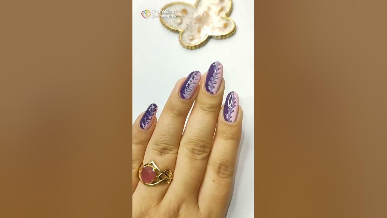 2. Floral Pink and Purple Nail Art - wide 11