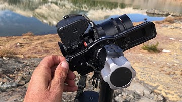 Capturing parallax-free panoramas and multi-row stitched images