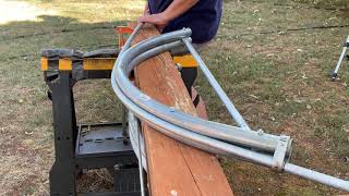 Making 4 ft. Hoops for your garden. Hoop bender by Johnny`s.