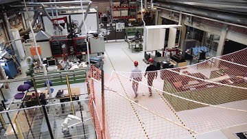 Fully autonomous drone flying in an indoor industrial environment.