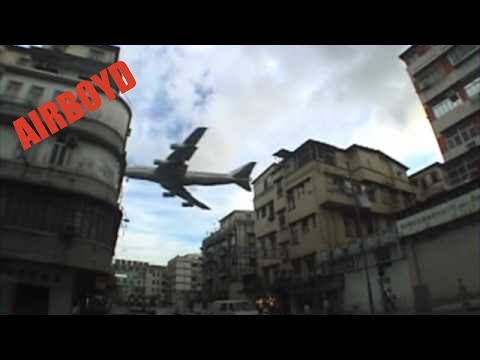 Very Low Planes Over Kowloon • Hong Kong