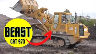 CAT 973 Loading Trucks