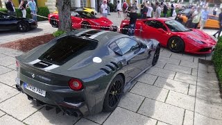 Two of my very favourite cars driving together in velden, austria. the
ferrari laferrari and f12 tdf finished grigio scuro. you can see he...