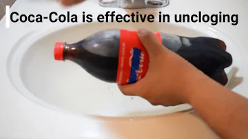 How do you clear a clogged drain with Coke?